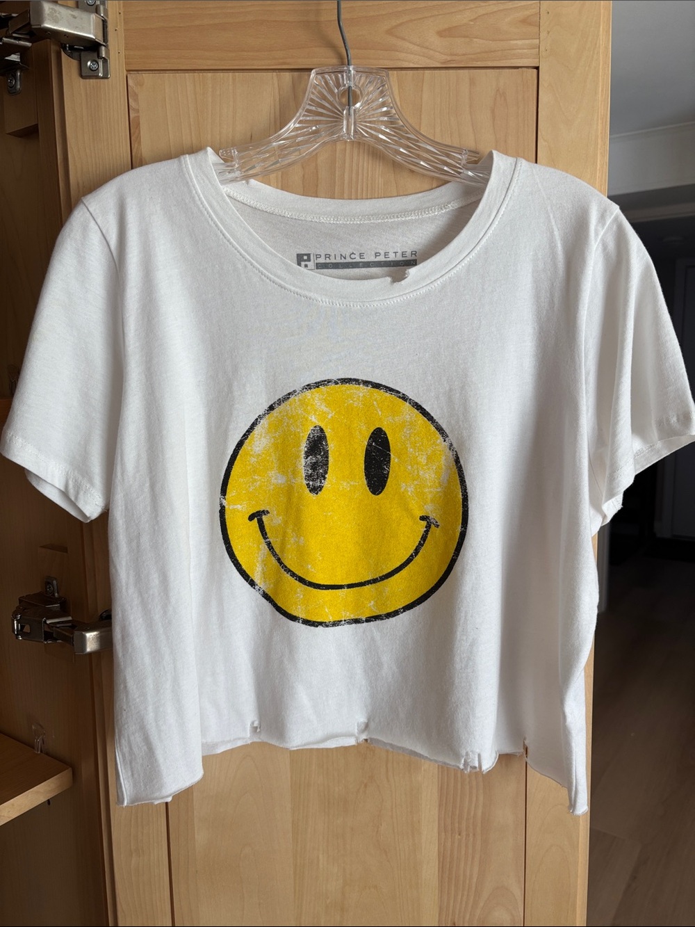Prince Peter Collection White Cropped Tee with Yellow Smiley Graphic